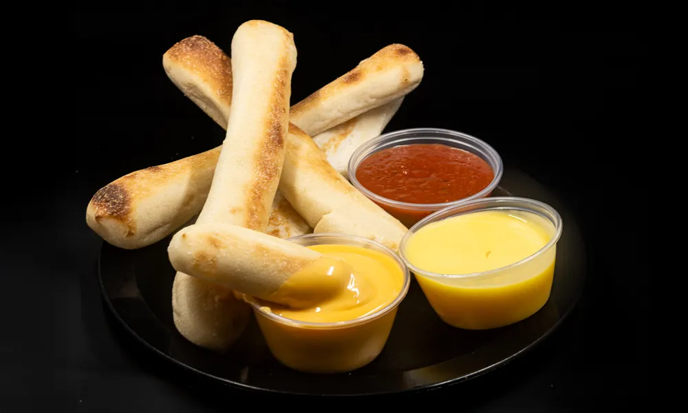 Noble Roman's Famous Breadsticks with Spicy Cheese, Garlic and Marinara sauces