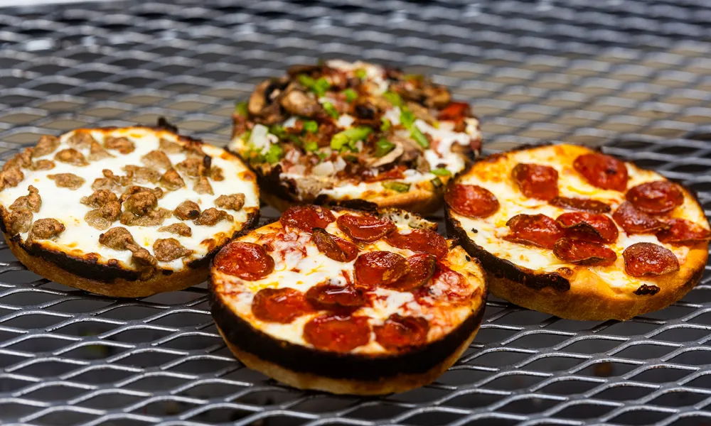 Noble Roman's Pan One Pizza: Sausage, The Works, Pepperoni