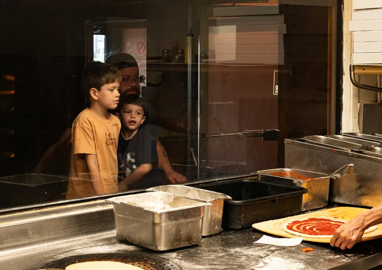 Watching through the Noble Roman's Pizza Window